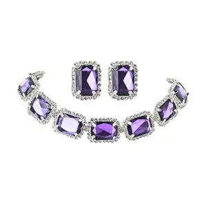 Elegant purple necklace and earrings displayed on a black mannequin, showcasing a chic and stylish jewelry set